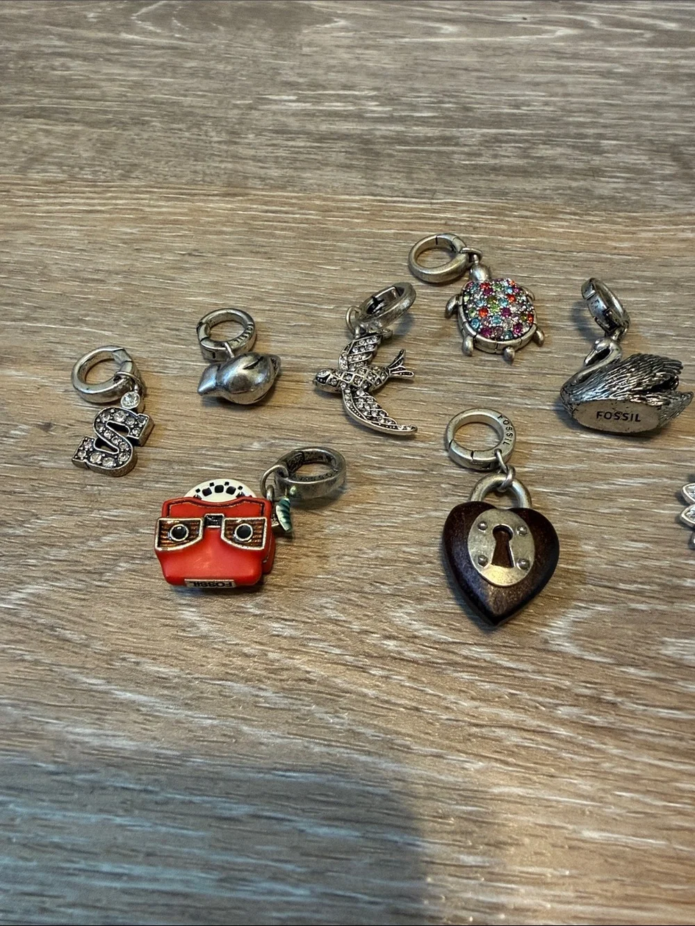 Fossil Silver Tone Adjustable Charm Bracelet 8 Charms Retired Rare